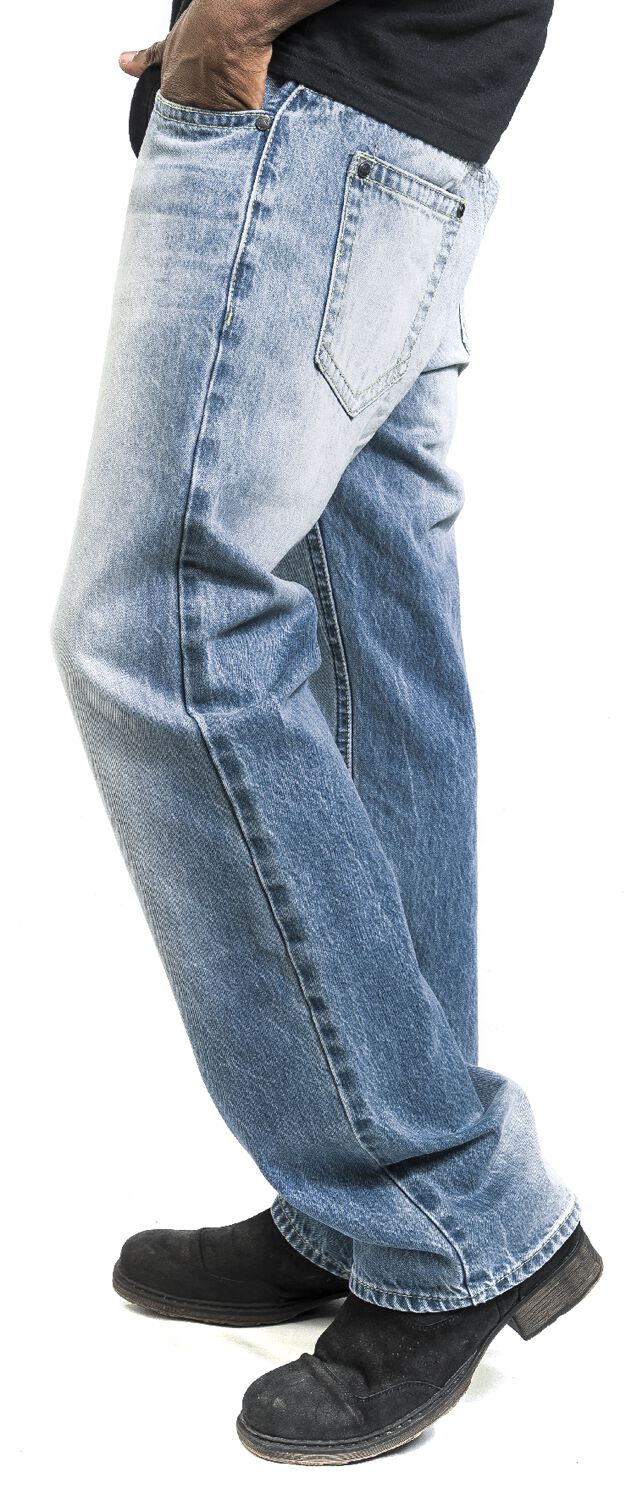 Jeans ampio in denim blu con risvolto alto